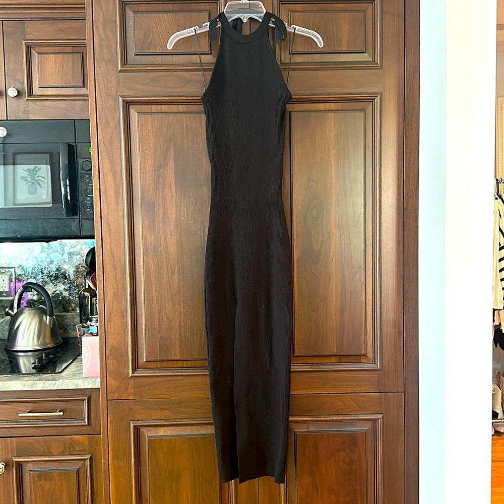 Gorgeous midi black dress. Work once. Size Small. Very stretchy material.